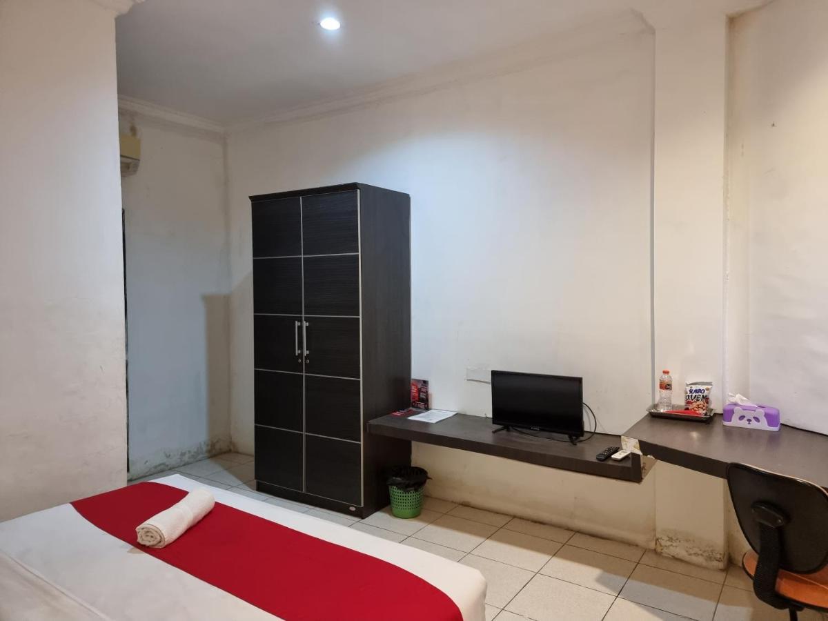 Oyo 90450 Sentra Inn Medan Exterior foto